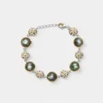 18K gold plated sterling silver abalone shell link bracelet with round ocean-toned inlays and woven silver-gold textured discs.