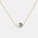 18K gold plated sterling silver necklace featuring an abalone shell and a white pearl in a minimalist centered round shape.