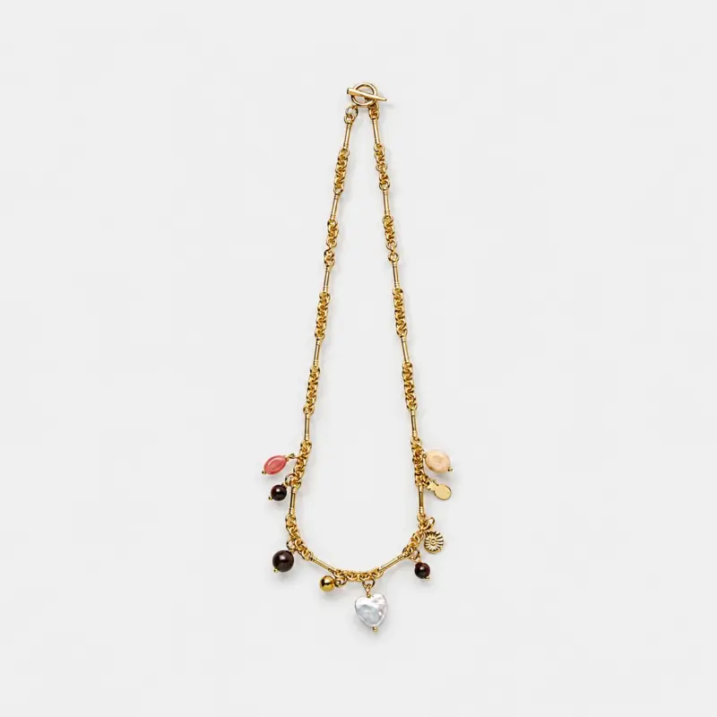 18K gold-plated copper shell and agate charms necklace with a layered toggle chain style.