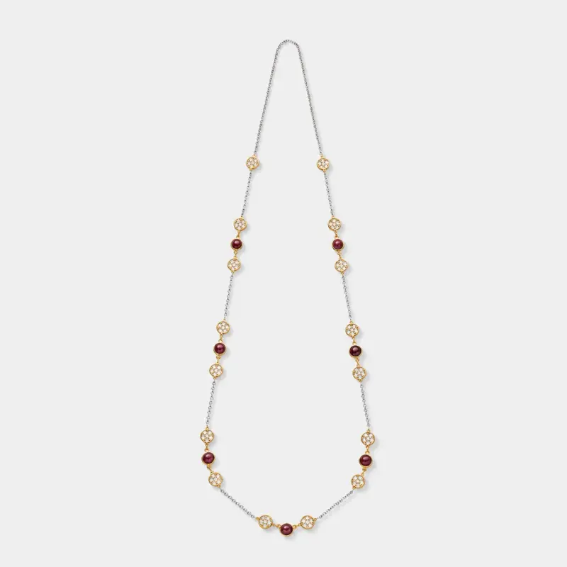 18K gold plated sterling silver necklace featuring round rubies and cubic zirconia in a long blossom station style.