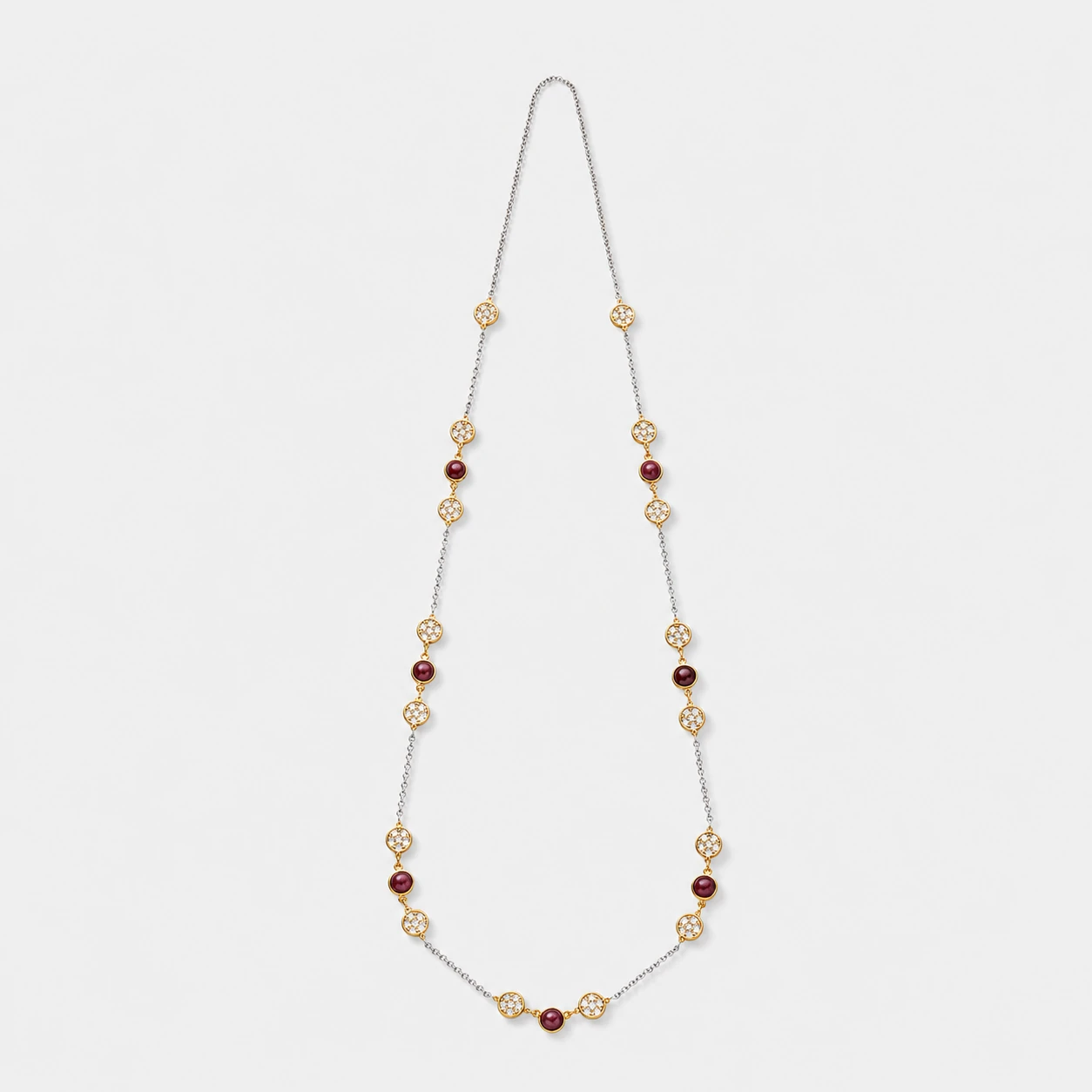 18k-gold-plated-silver-ruby-station-necklace-long-blossom-shape 18K gold plated sterling silver necklace featuring round rubies and cubic zirconia in a long blossom station style.
