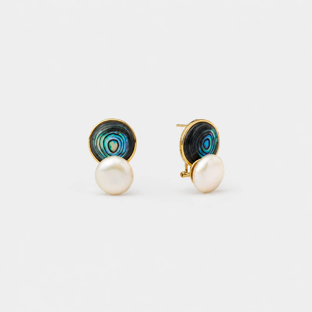 18k-gold-plated-sterling-silver-abalone-shell-pearl-stud-earrings-circular-minimalist 18K gold plated sterling silver abalone shell and pearl stud earrings featuring a minimalist circular stacked geometric shape.