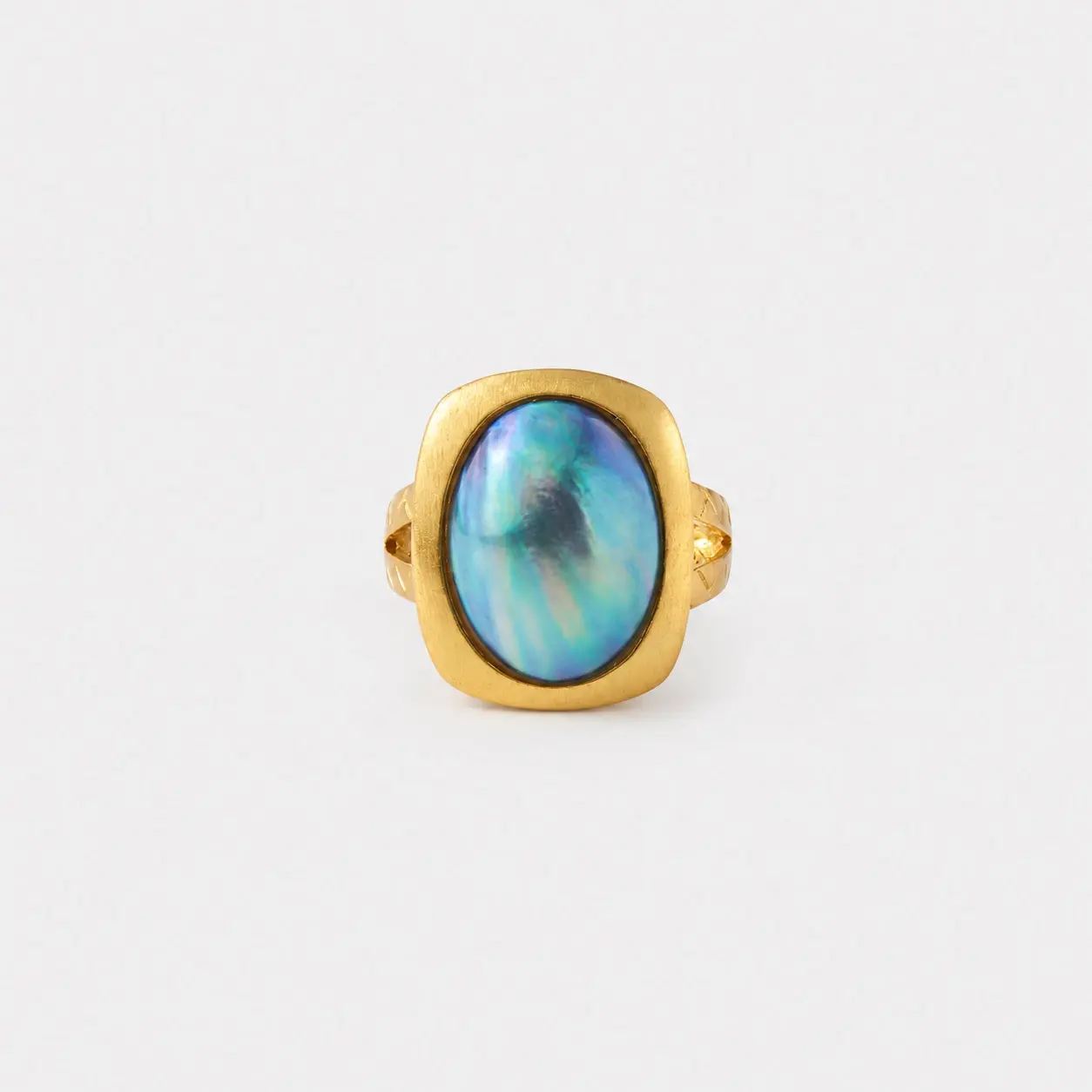 18k-gold-plated-sterling-silver-blue-mabe-pearl-ring-bold-rounded-statement-frame 18K gold plated sterling silver blue mabe pearl ring in a bold rounded statement frame silhouette
