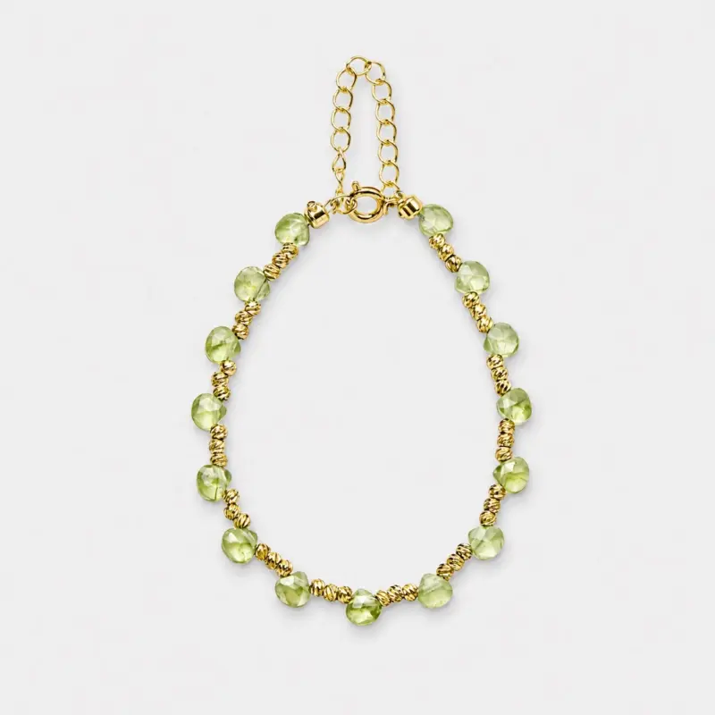 18K gold plated sterling silver green peridot bead strand bracelet in a minimalist adjustable silhouette