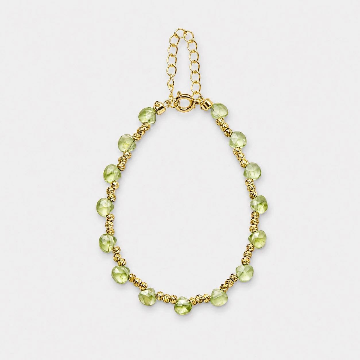 18k-gold-plated-sterling-silver-green-peridot-bead-strand-bracelet-minimalist 18K gold plated sterling silver green peridot bead strand bracelet in a minimalist adjustable silhouette