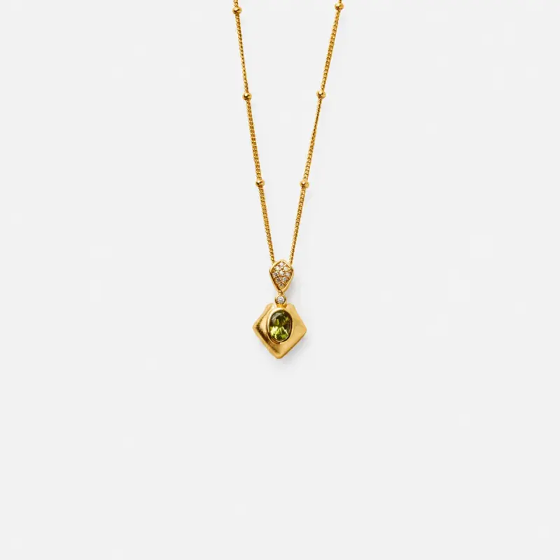 18K gold plated sterling silver green peridot pendant necklace in a minimalist diamond shape silhouette