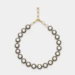 18K gold plated sterling silver necklace featuring round white pearls surrounded by graphic black spinel halos.