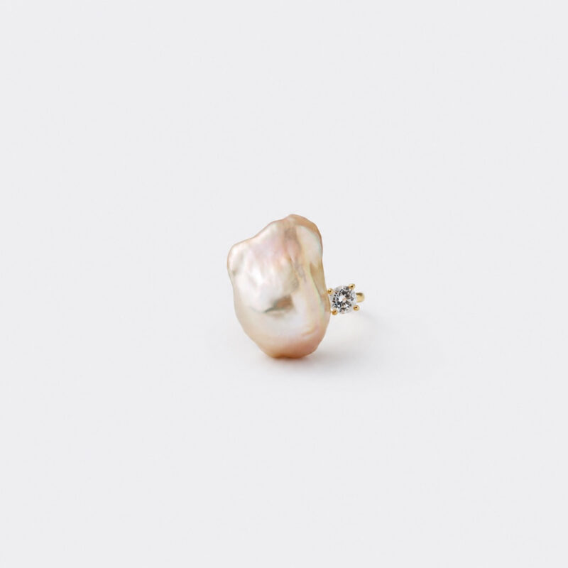 18K gold plated sterling silver pink baroque pearl ring featuring a fluid open curved band design