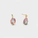 18K gold plated sterling silver pink baroque pearl stud earrings featuring a delicate prong-set cz stone and organic petal-shaped contours.
