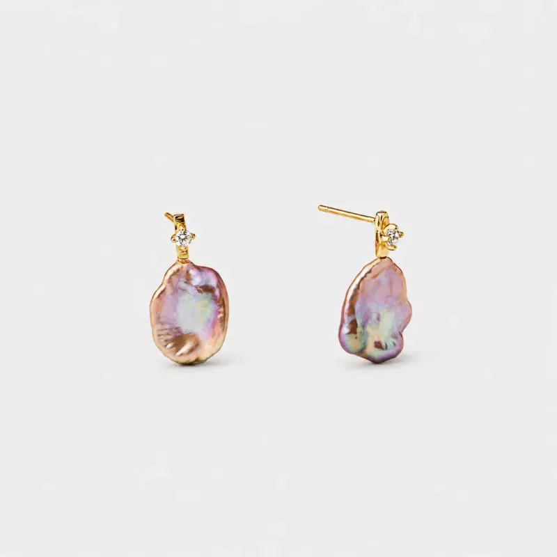 18K gold plated sterling silver pink baroque pearl stud earrings featuring a delicate prong-set cz stone and organic petal-shaped contours.
