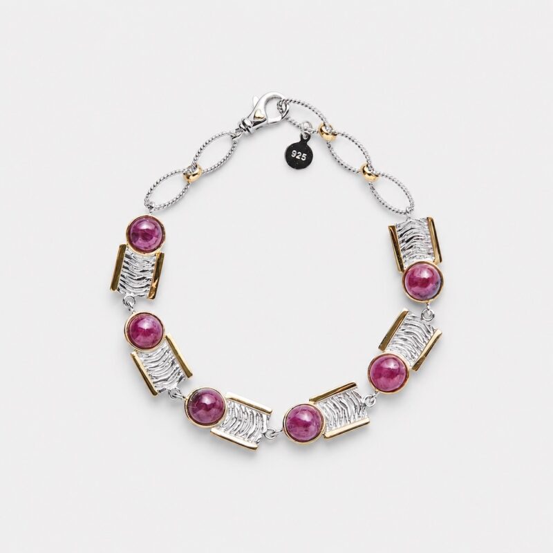 18K gold plated two-tone sterling silver ruby link bracelet featuring textured rectangular geometric panels and a secure lobster clasp.