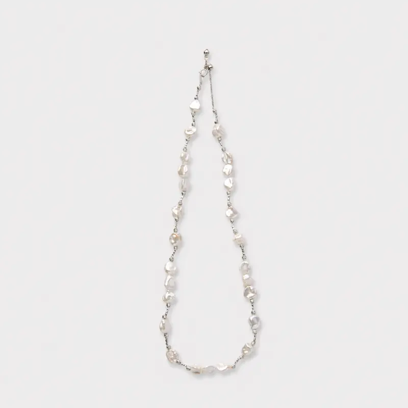 925 sterling silver handcrafted petal baroque pearl necklace featuring a relaxed asymmetric design with natural soft luster