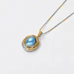 ONDA LENTA Blue Mabe Pearl Necklace with an oval blue pearl pendant and two-tone chain.