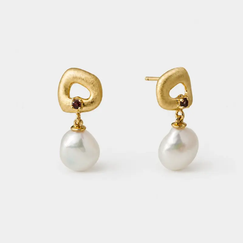 Brushed 18K gold plated sterling silver garnet and pearl drop earrings in a hollow organic oval silhoue