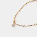 Close-up detail view showcasing the shimmering zircon charm and delicate bead chain links of the Shimmer bracelet crafted with high-polish 18k gold plating over sterling silver