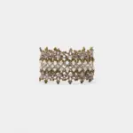 Front view showing the intricate beaded mesh pattern of the wide textile cuff bracelet accented with clustered golden beads and a smooth shell clasp.