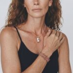 Model wearing Eva Baroque Pearl Necklace elegantly at the collarbone.
