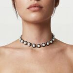 Model wearing Pearl Spinel Necklace closely around her neck as a statement choker for an elegant evening style look.