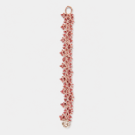 Palladium plated copper red garnet beaded bracelet featuring a slim vertical lace-like floral structure with an openwork design.