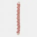 Palladium plated copper red garnet beaded bracelet featuring a slim vertical lace-like floral structure with an openwork design.