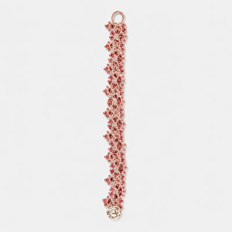 Palladium plated copper red garnet beaded bracelet featuring a slim vertical lace-like floral structure with an openwork design.