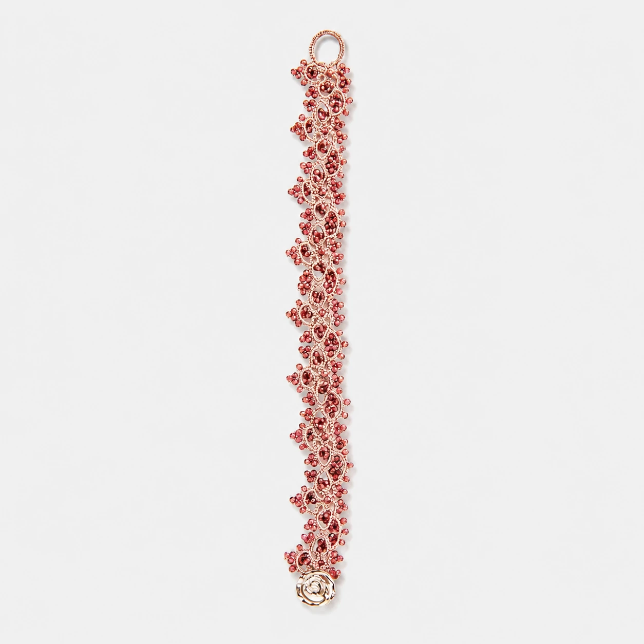 palladium-plated-copper-garnet-beads-bracelet-woven-floral-lace Palladium plated copper red garnet beaded bracelet featuring a slim vertical lace-like floral structure with an openwork design.