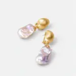 ONDA LENTA Queen Pink Baroque Pearl Drop Earrings with luminous organic pearls and sculptural gold-tone tops.