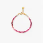 ONDA LENTA pink tourmaline beaded bracelet featuring faceted gradient stones and an adjustable gold-tone extension chain.