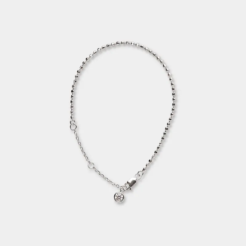 Rhodium plated 925 sterling silver cubic zirconia chain bracelet in a minimalist fine bead silhouette