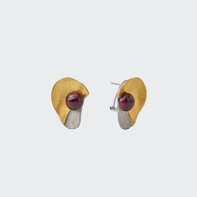 18K gold plated sterling silver textured mixed-metal stud earrings featuring a round red ruby cabochon in an organic sculptural curved shape.