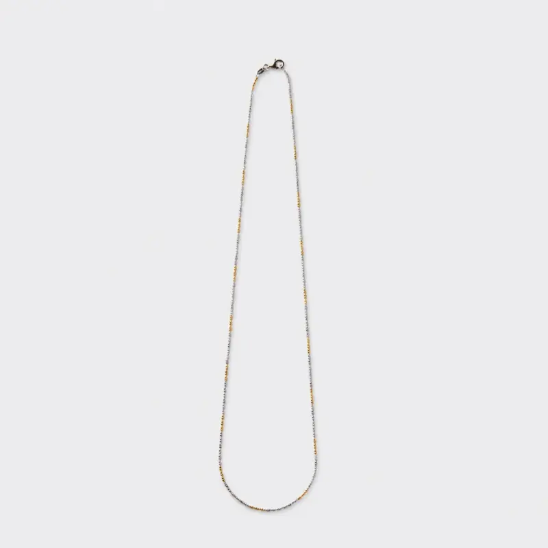 Two-Tone Chain Necklace with alternating gold and silver-tone links by ONDA LENTA