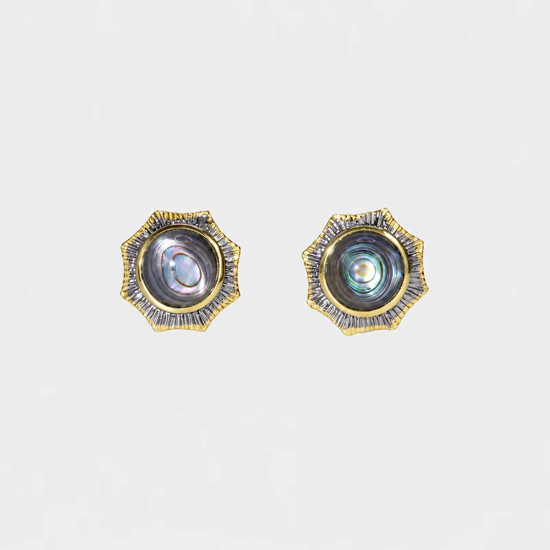 ONDA LENTA Star Abalone Shell Stud Earrings front view, featuring natural iridescent abalone shell centers and sculptural two-tone star-shaped settings.